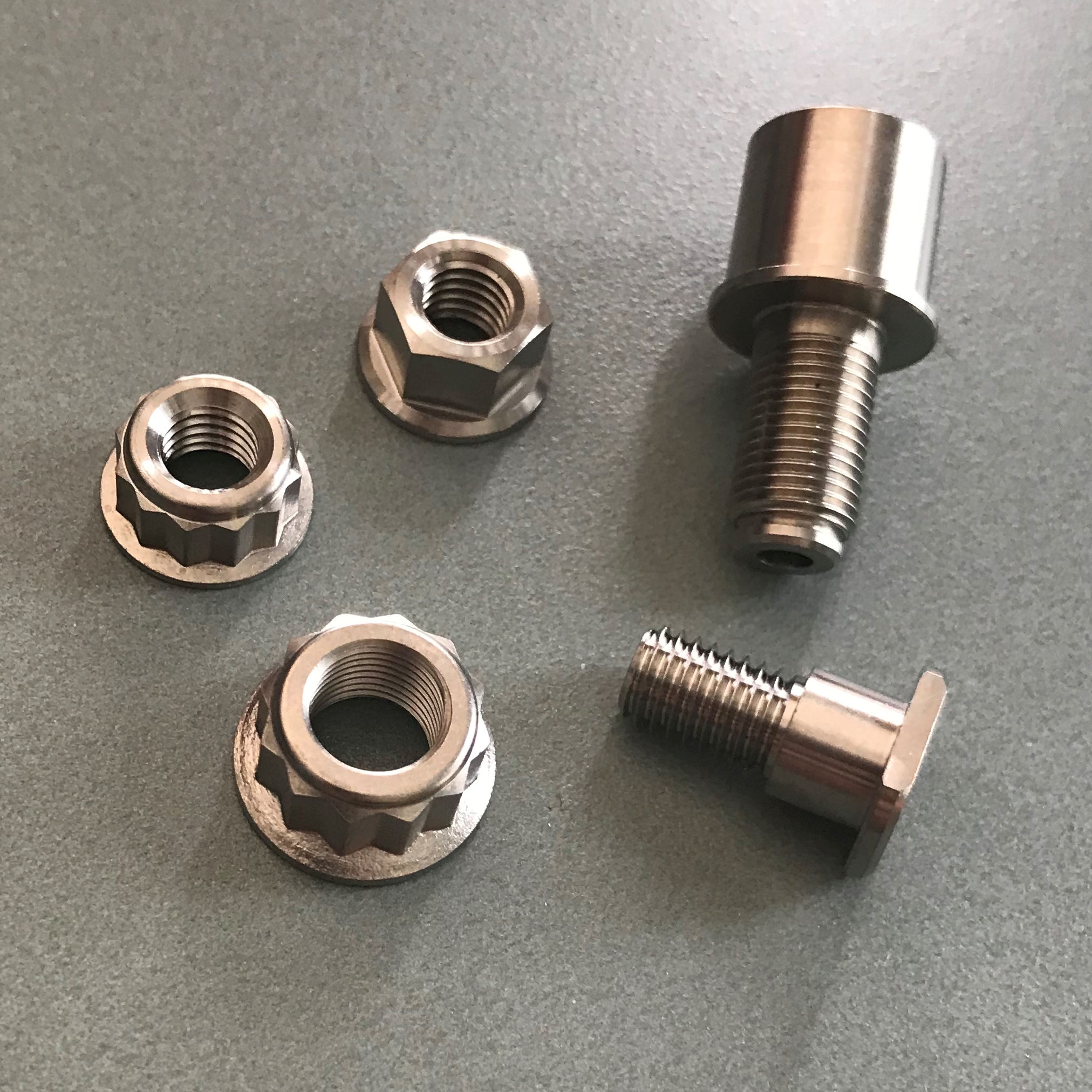 AEM Factory Replacement Titanium Nuts, Studs, and Rubber